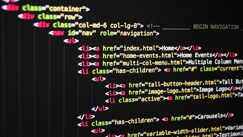 A close-up of a computer screen displaying lines of programming code in multiple colors, including orange, pink, green, and yellow, on a dark background. The code features syntax and function elements