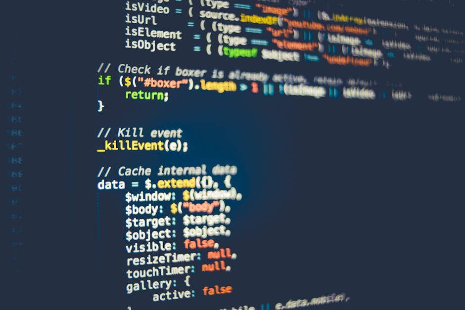 A photograph of a computer screen displaying lines of HTML code in a code editor. The code includes tags such as <html>, <head>, and <body>, with various linked stylesheets and image references. The s